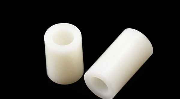 GenèveTraitement de la rondelle de protection en plastique isolante en plastique ABS directement à travers le joint de douille en nylon isolant de la colonne d'espacement